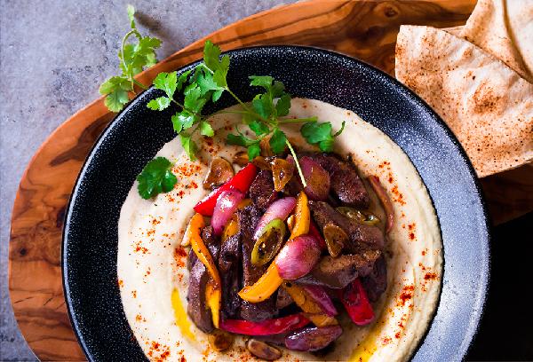 Veal liver fajitas with hummus salad